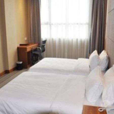 Wosen Hotel Дунгуань Экстерьер фото